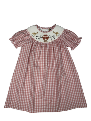 Red gingham bishop dress with hand-smocked Noah’s Ark animals across collar, short puff sleeves, and classic heirloom styling