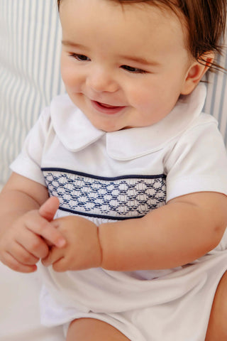 Baby boy Easter bubble with navy smocking and Peter Pan collar