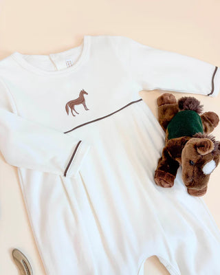 Close-up of Bradford Romper with horse embroidery and gray piping on soft Palmetto Pearl cotton, showing cozy fabric and Southern details