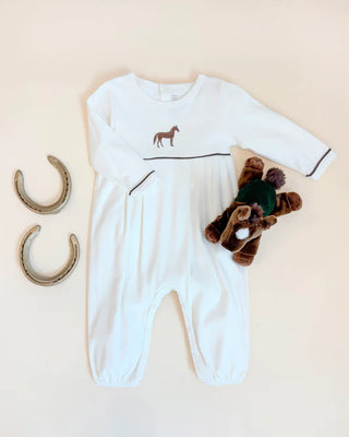 Bradford Romper in Palmetto Pearl with brown horse embroidery, gray piping, and long sleeves—styled with plush horse and horseshoes