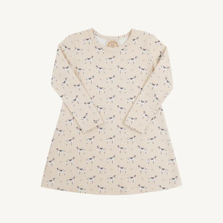 Flat lay of The Beaufort Bonnet Company Long Sleeve Polly Play Dress in Carolina Hunt Club dog print on soft oatmeal background.