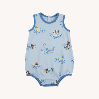 The Beaufort Bonnet Company Patton Play Bubble in Doggy Paddle print with Sunrise Blvd Blue trim, featuring puppies and beach balls on a baby boy romper.