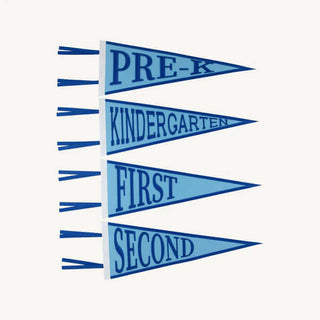 Scalloped grade-level pennants in Brookline Blue with grosgrain ribbon—perfect for Southern back-to-school milestone photos.