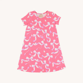 Polly Play Dress in Bagley Bows—pink girls’ A-line dress with white and lavender bow print, made of soft knit cotton by TBBC.