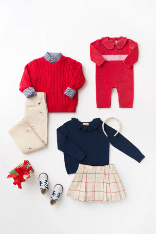 Samuel Smocked Romper in Richmond Red velour with white smocking and navy piping by The Beaufort Bonnet Company.