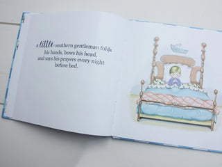 Little Southern Gentleman hardcover book in blue gingham—an heirloom keepsake for teaching boys values with Southern charm and grace.