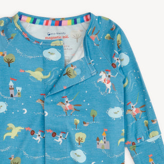 Close-up of Good Knight print with dragons, castles, and knights on blue modal fabric on Magnetic Me Convertible Coverall.