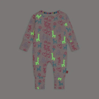 Glow-in-the-dark Magnetic Me coverall with party balloon animal print on pink background.