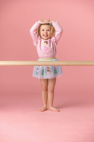 Pink ballerina sweatshirt with sequin and tulle applique, ruffle sleeves, and ribbed trim—perfect for little dancers and cozy days.