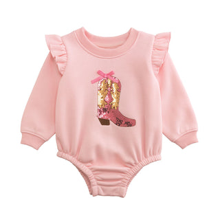 Mud Pie pink baby bubble with sequin cowgirl boot and ruffle shoulders—cozy French terry romper for your little cowgirl's fall adventures.