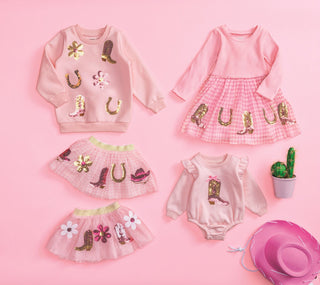 Pink Western outfits with sequin boots, flowers, and horseshoes—includes tutu skirts, sweatshirts, and sweatshirt bubble.adventures.