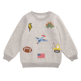 Boys gray sweatshirt with playful patches—features dinos, trucks, planes, football, and more for everyday adventure.