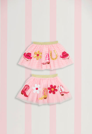 Mud Pie pink Western tutus with sequin boots, hats, and flowers—available in gingham or tulle for your little cowgirl's dress-up and play.