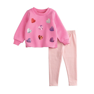 Pink sequin heart sweatshirt with striped leggings—a sparkly, cozy outfit perfect for school, playdates, and everyday fun.