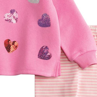 Pink sequin heart sweatshirt with striped leggings—a sparkly, cozy outfit perfect for school, playdates, and everyday fun.