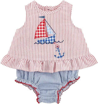 Mud Pie sailboat pinafore set with flounce hem and bloomers, featuring ticking stripe fabric and sweet sailboat appliqué.