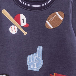 Boys navy sweatshirt with sporty patches—features football, baseball, soccer, and basketball for your little all-star.
