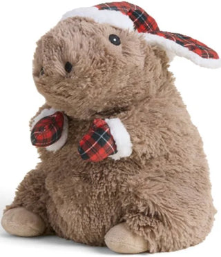 Side view of holiday Warmies Cozy Capybara with plaid fur trimmed mittens and winter hat, showing soft plush details