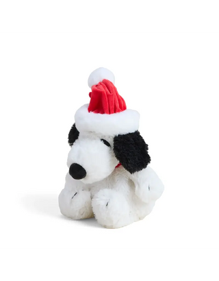 Side view of holiday Warmies Snoopy plush with red Santa hat, showing soft black ears and white fur on a white background.