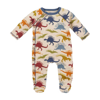Waffle knit baby sleeper with colorful dinosaur print, wood buttons, and footed design; soft cotton-blend for cozy bedtime fun.