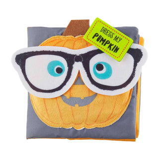 Soft pumpkin-themed baby book with felt dress-up pieces and glasses; perfect for interactive Halloween fun and sensory play.
