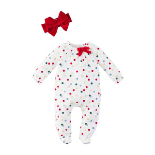 White footed baby sleeper with red, green, gold, and blue polka dots, includes a matching red velour bow headband for holiday style.