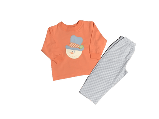 Boys’ orange snowman top with light blue gingham pants, perfect for winter days, holiday events, and festive family photos.