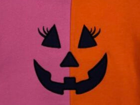 Girls' short sleeve sweatshirt with pink and orange design featuring a jack-o'-lantern face.