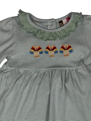 Girls' Thanksgiving outfit with green and white striped dress with turkey appliquie and leggings.
