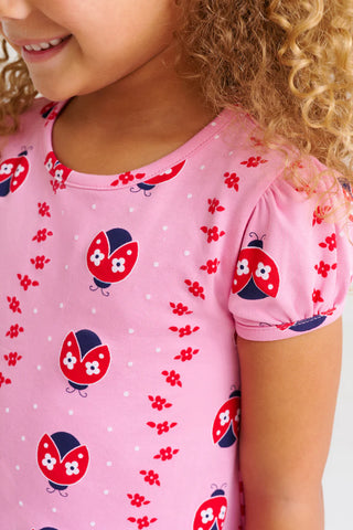 Close-up of Ladybug Lineup print on The Beaufort Bonnet Company Penny's Play Dress