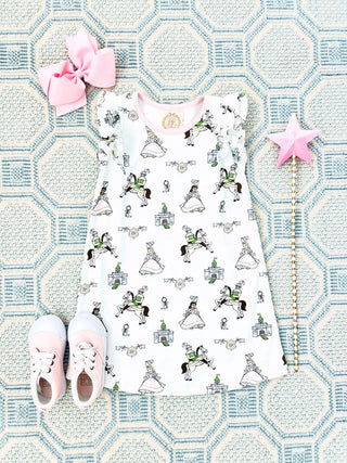 Ruehling Ruffle Dress – Darling Duchess with Palm Beach Pink by The Beaufort Bonnet Company styled with pink shoes and  bow.