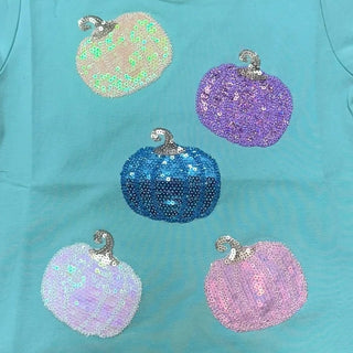 Emma Jean Kids Pumpkin Patch short sleeve tee for fall with five sparkly sequin pumpkins in pastel colors on a light aqua background.
