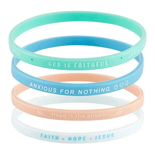 God Is Faithful bracelet set showing four silicone bracelets with phrases God Is Faithful, Anxious for Nothing, Hope Is the Answer, Faith Hope Jesus