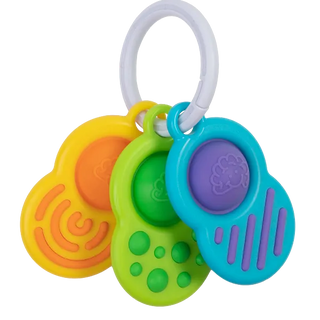Close-up of Fat Brain Toys Dimpl Clutch showing three colorful textured silicone keys on a ring designed for sensory exploration