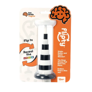 Fat Brain Flipty toy in packaging showing black and white stack with instructions to flip and reveal magic color change