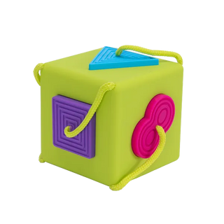 Close-up of OombeeCube with colorful geometric silicone shapes attached by cords, designed to prevent lost pieces during play