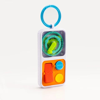 PlayTab Go shown standing upright, featuring gears, sensory tiles, and a blue ring for attaching to diaper bags or strollers.