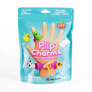 Front of blue Plip Charms package featuring a bracelet, ring, and silicone charms like soccer ball, pizza slice, pickle, and duck.