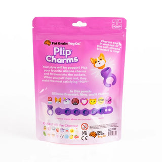 Back of pink Plip Charms pouch featuring purple bracelet, ring, and charms including corgi, hearts, emoji faces, cat, and unicorn.