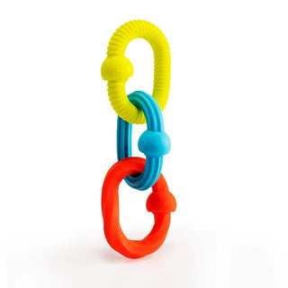 Plip Grips silicone teether links in red, yellow, and blue shown upright and connected with a fun pop for sensory exploration and soothing.