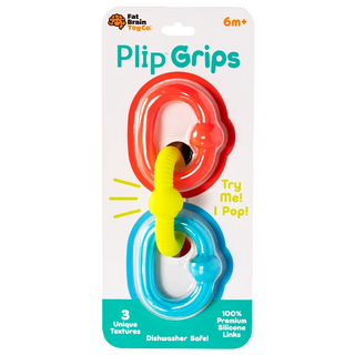 Plip Grips baby teether links in red, yellow, and blue on retail card with pop connector and soft silicone texture details shown.
