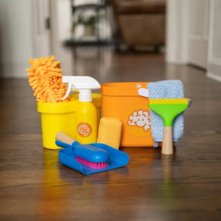 Pretendables Cleaning Kit includes toy mop, sponge, spray bottle, scrub brush, squeegee, towel, and buckets neatly displayed on wood floor.