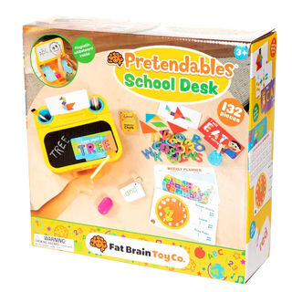 Retail packaging of Pretendables School Desk showing 132-piece toy kit with chalkboard, flashcards, letters, tangrams, and clock.