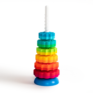Fully stacked Fat Brain SpinAgain toy with rainbow-colored discs on white corkscrew pole and blue base, standing upright.