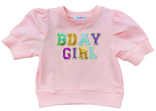 Lulu Bebe Puff Sleeve Pink Sequin BDay Girl Top with rainbow sequin lettering, soft cotton blend fabric, and ribbed cuffs for birthday outfits.