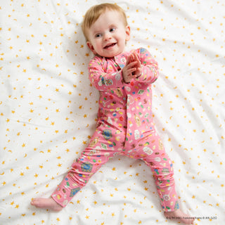Pink convertible coverall from Magnetic Me grows with your child, converting footie to cuff.