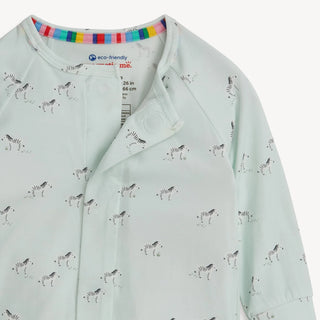 Close-up of Magnetic Me teal modal convertible coverall showing sweet zebra pattern and hidden magnetic closures