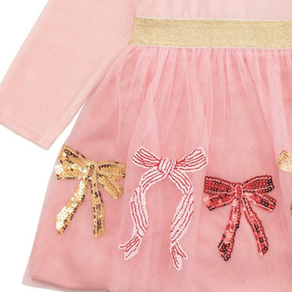 Blush pink velour tutu dress with long sleeves, gold waistband, and sequin bows—perfect for holiday parties and family photos.