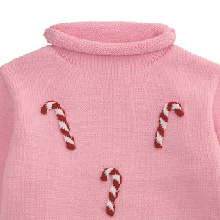 Pink rollneck sweater with crochet candy canes—cozy holiday knit for girls who love sweet style and classic 