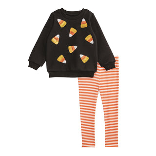 Girls Halloween outfit set with sequin candy corn sweatshirt and orange striped leggings—perfect for fall fun and class parties.
